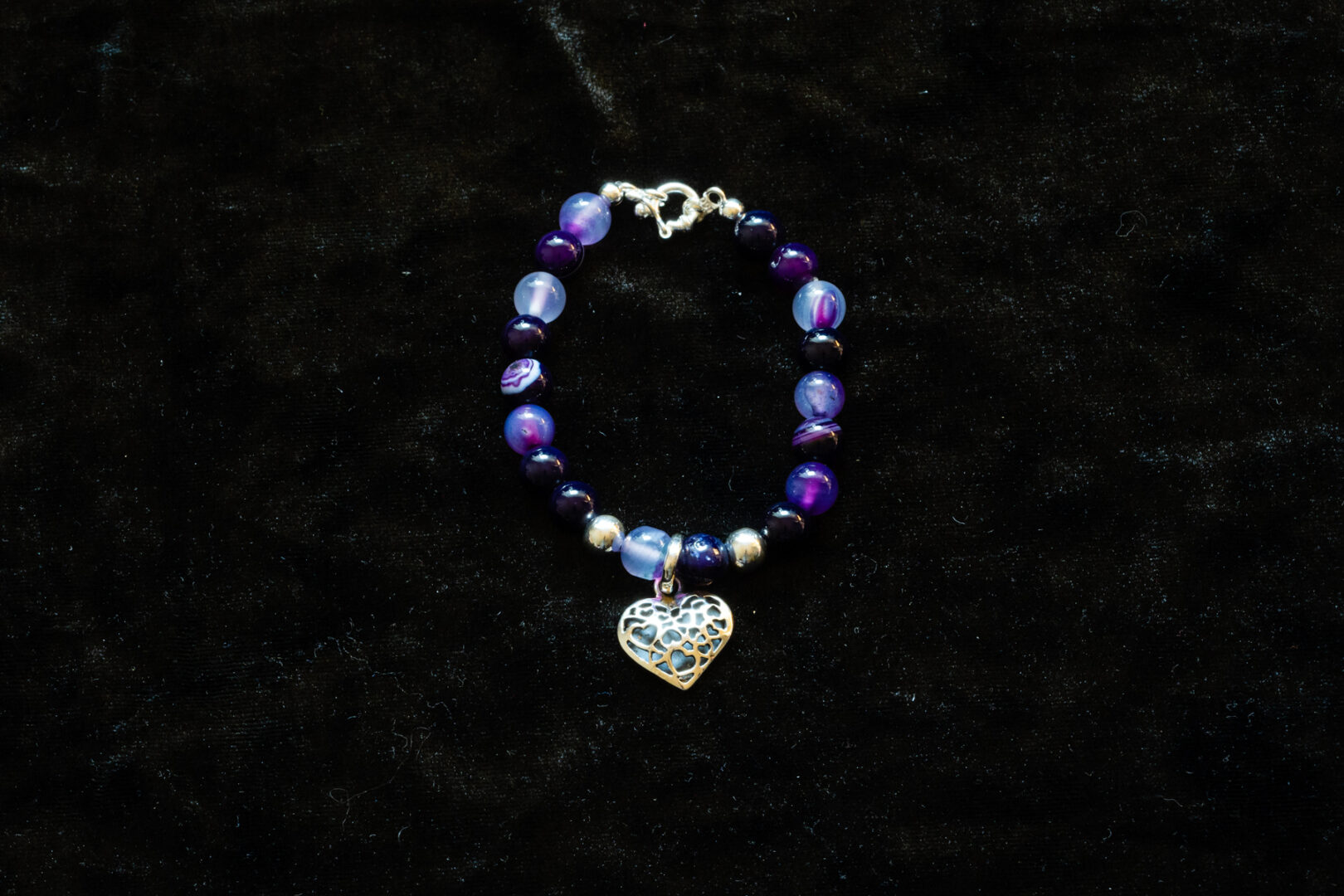 A Blue Color Bracelet with Sterling Silver Heart