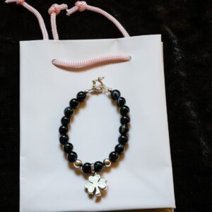 A Black Bead Bracelet with Sterling Silver Clover