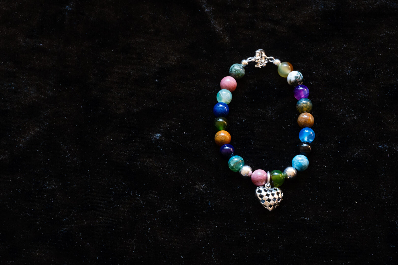 A Beautiful Multi Color Beaded Bracelet with a Heart