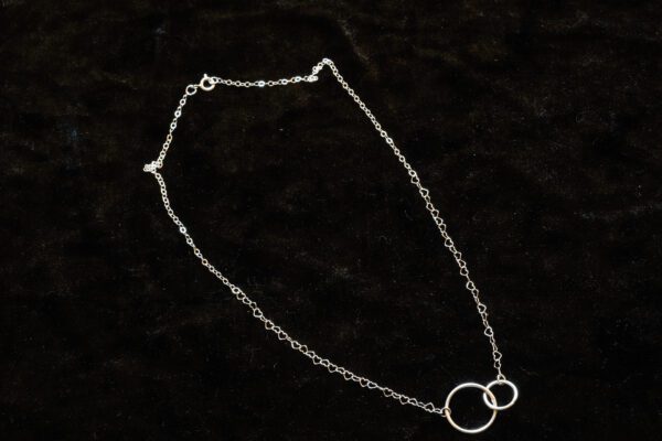 A picture of a light silver jewelry with rings