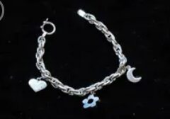 Sterling Silver Bracelet with Silver heart, moon and flower