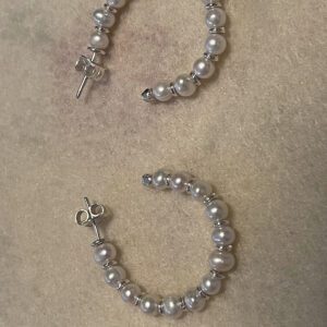 A pearl based earrings for women