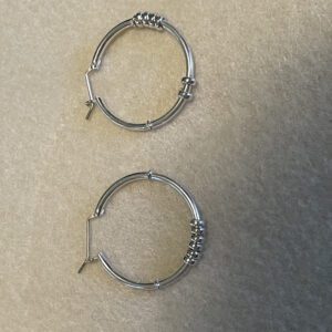 A simple casual wear earrings for women in silver