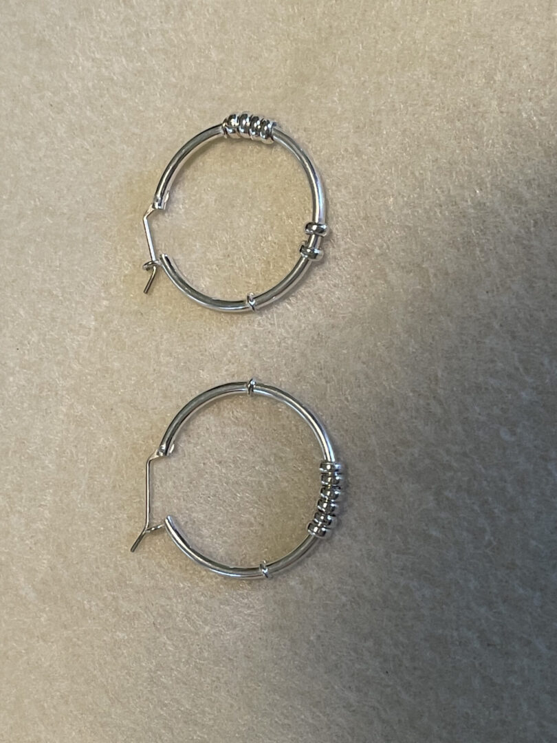 A simple casual wear earrings for women in silver